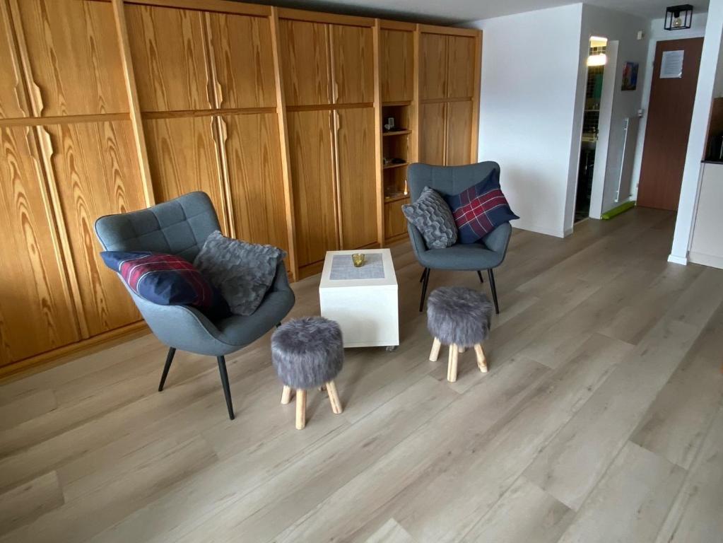 Posezení v ubytování Modernes Wohlfühlstudio im Haus Eldorado mit Traumaussicht