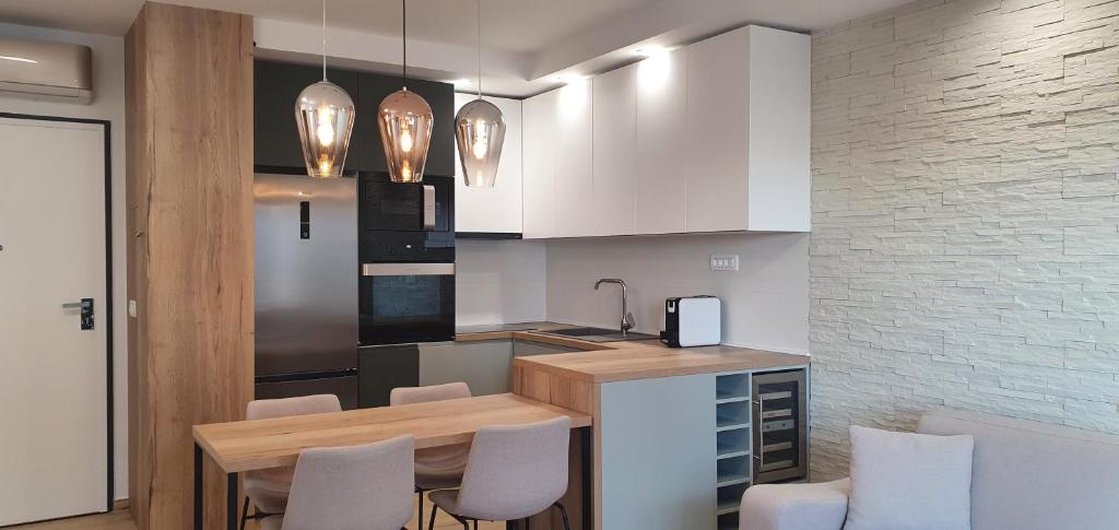 Kuchyňa alebo kuchynka v ubytovaní Apartments Elite