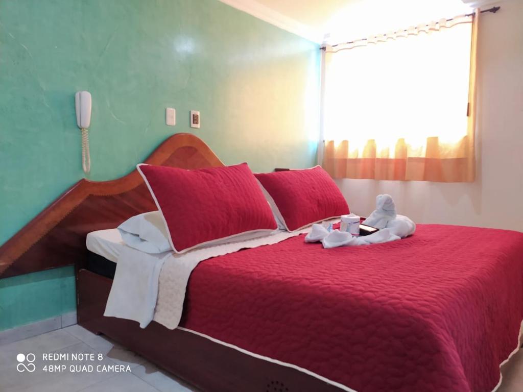 Postel nebo postele na pokoji v ubytování Hospedaje Wicirare