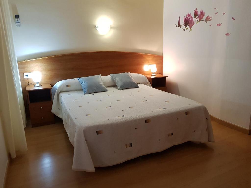 Postel nebo postele na pokoji v ubytování Hostal Mary - ADULTS ONLY