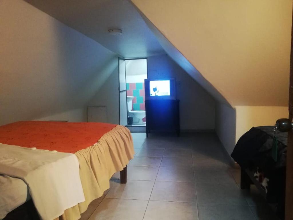 Postel nebo postele na pokoji v ubytování Hospedaje Wicirare