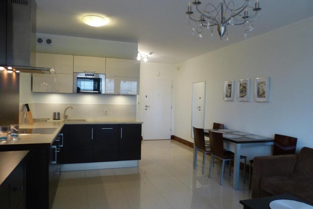 Η κουζίνα ή μικρή κουζίνα στο Apartament Perełka