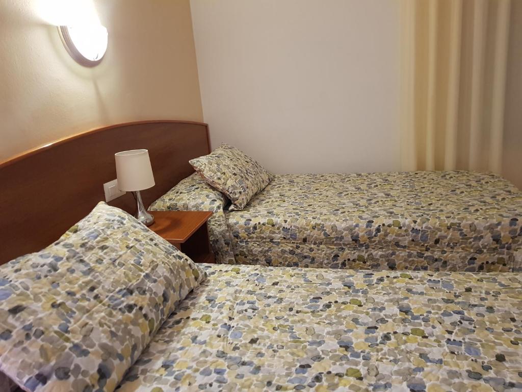 Postel nebo postele na pokoji v ubytování Hostal Mary - ADULTS ONLY