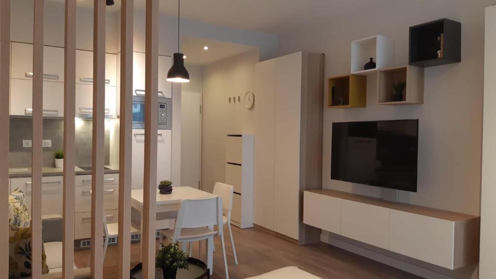 TV a/nebo společenská místnost v ubytování Beach&Pool