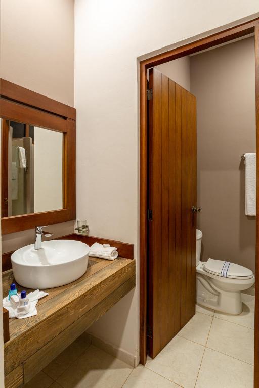 Um banheiro em Xuux Peek by Tecnohotel