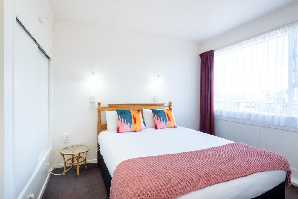 Postel nebo postele na pokoji v ubytování Chevron Motel
