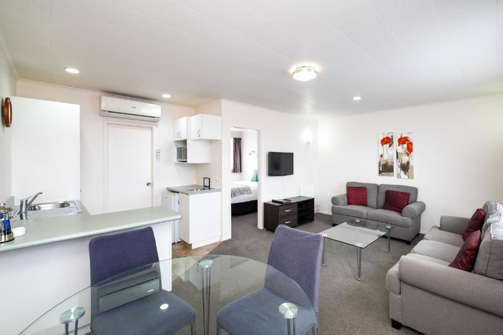 Kuchyň nebo kuchyňský kout v ubytování Chevron Motel