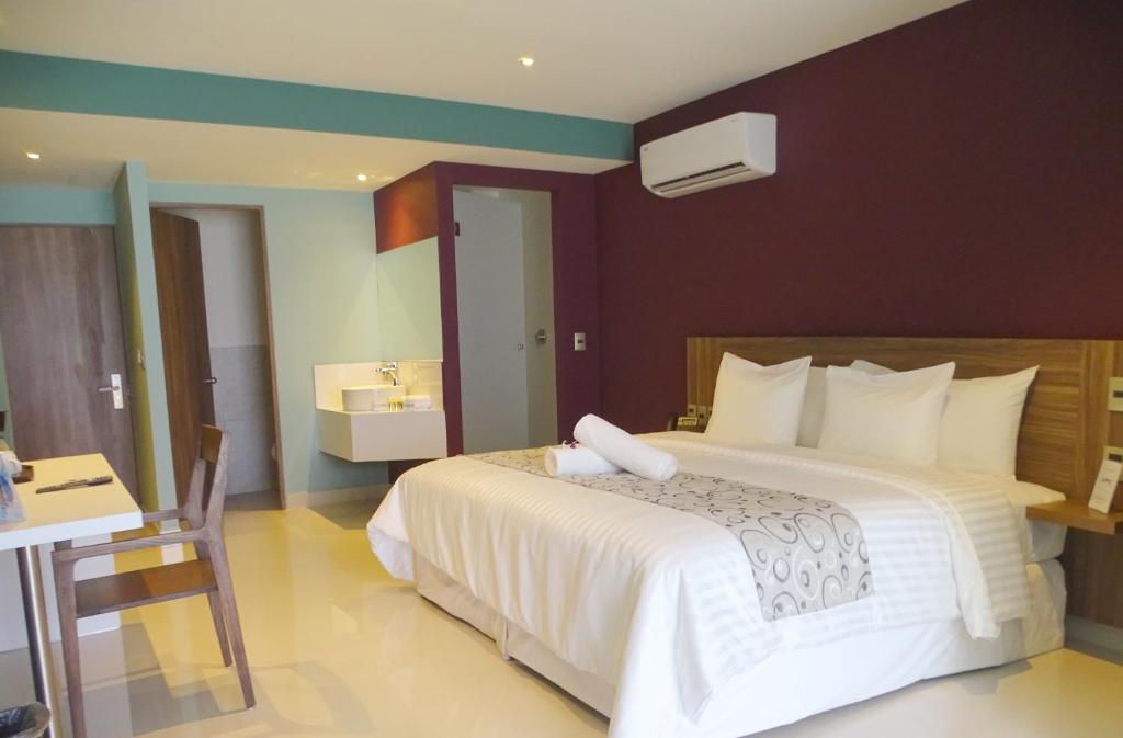 Postel nebo postele na pokoji v ubytování Hotel Luma by Kavia