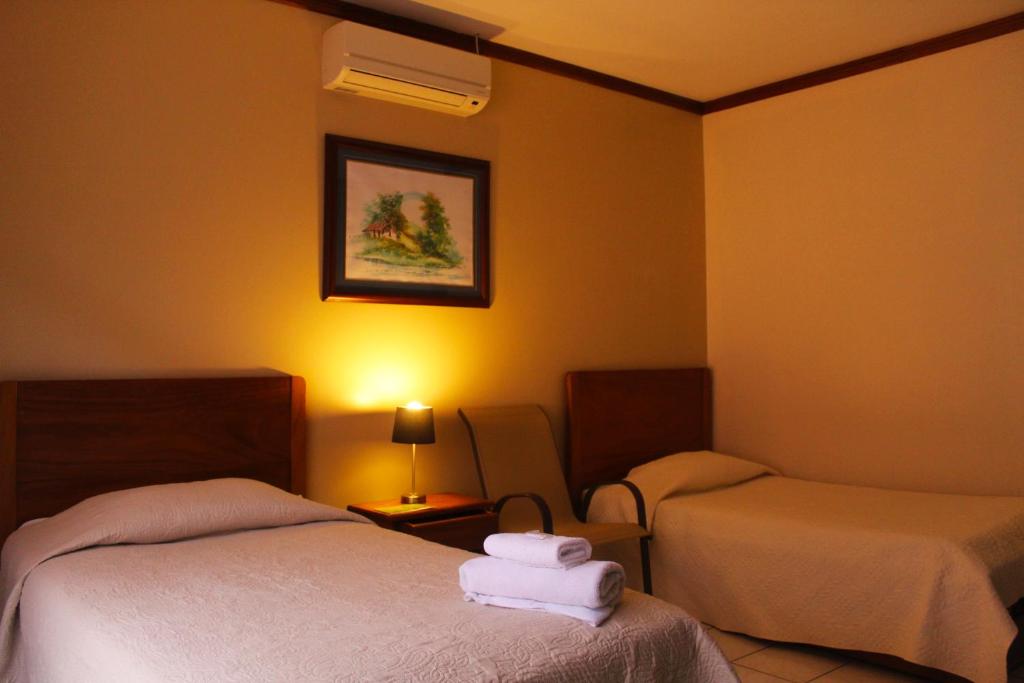 Katil atau katil-katil dalam bilik di Hotel Guadalupe