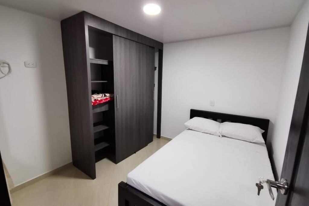 Postel nebo postele na pokoji v ubytování Hermoso y cómodo apartamento