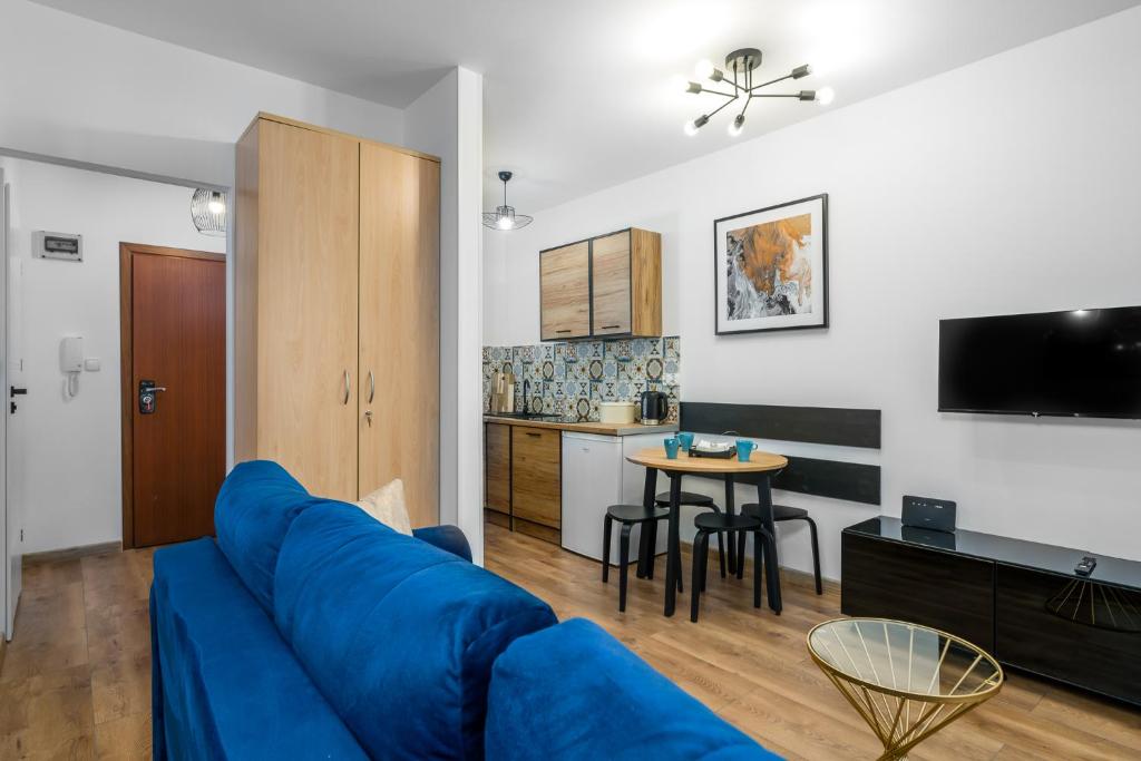 Televízia a/alebo spoločenská miestnosť v ubytovaní Sleepway Apartments - Modern Dream
