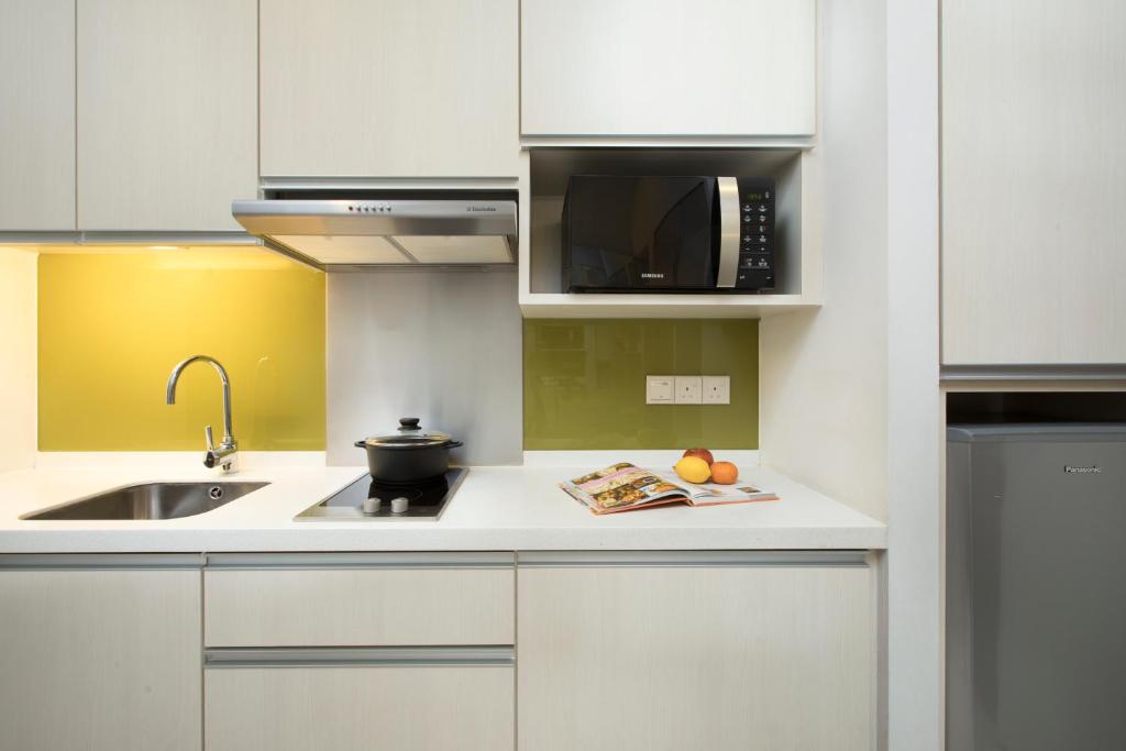 Una cocina o zona de cocina en Citadines Uplands Kuching