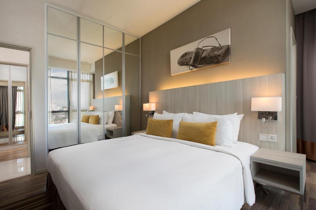 Cama o camas de una habitación en Citadines Uplands Kuching