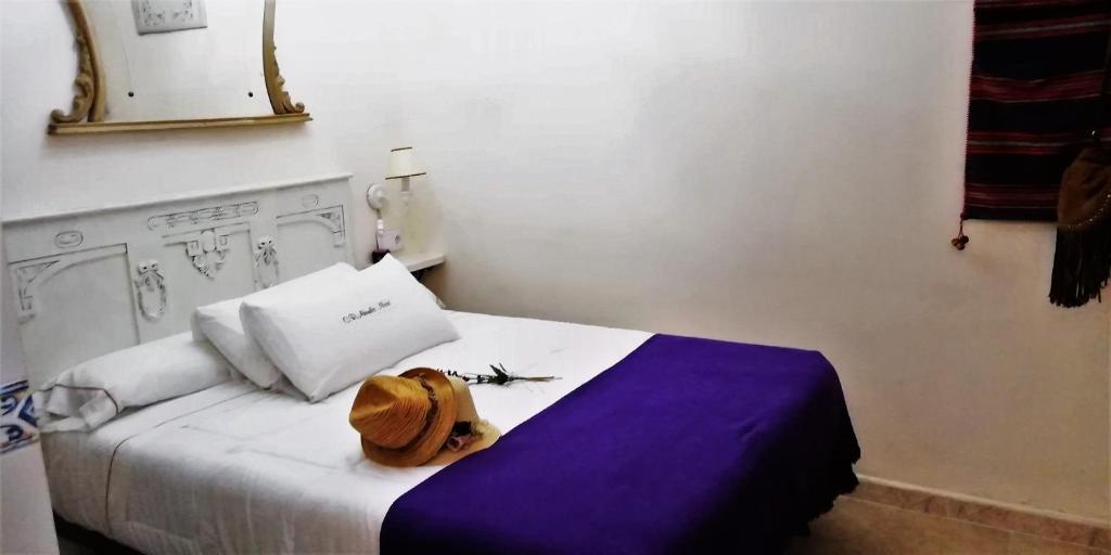 Postel nebo postele na pokoji v ubytování Casa Rural Abuela Maxi