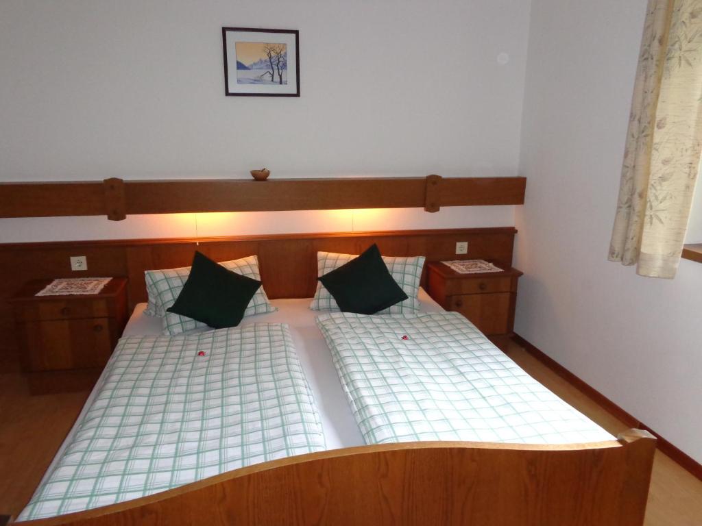Postel nebo postele na pokoji v ubytování Haus Helga