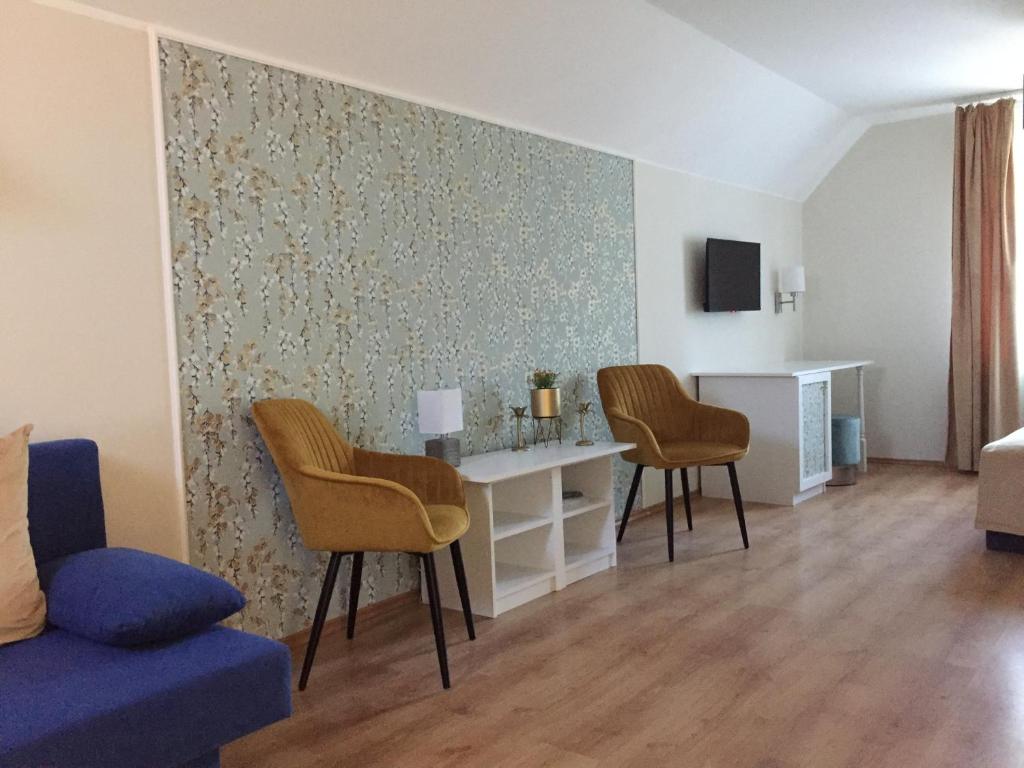 Telewizja i/lub zestaw kina domowego w obiekcie Kikerics vendégház