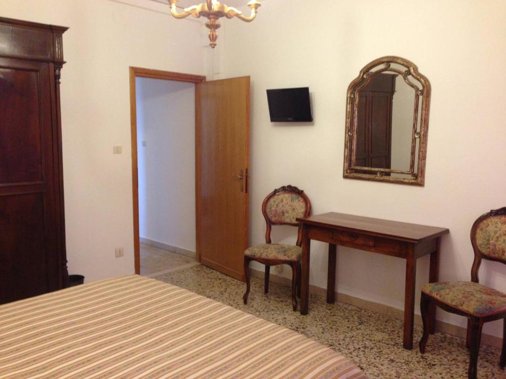 Postel nebo postele na pokoji v ubytování Casa del Pozzo