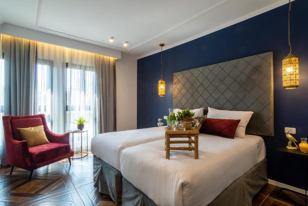 Postel nebo postele na pokoji v ubytování Eldan Hotel
