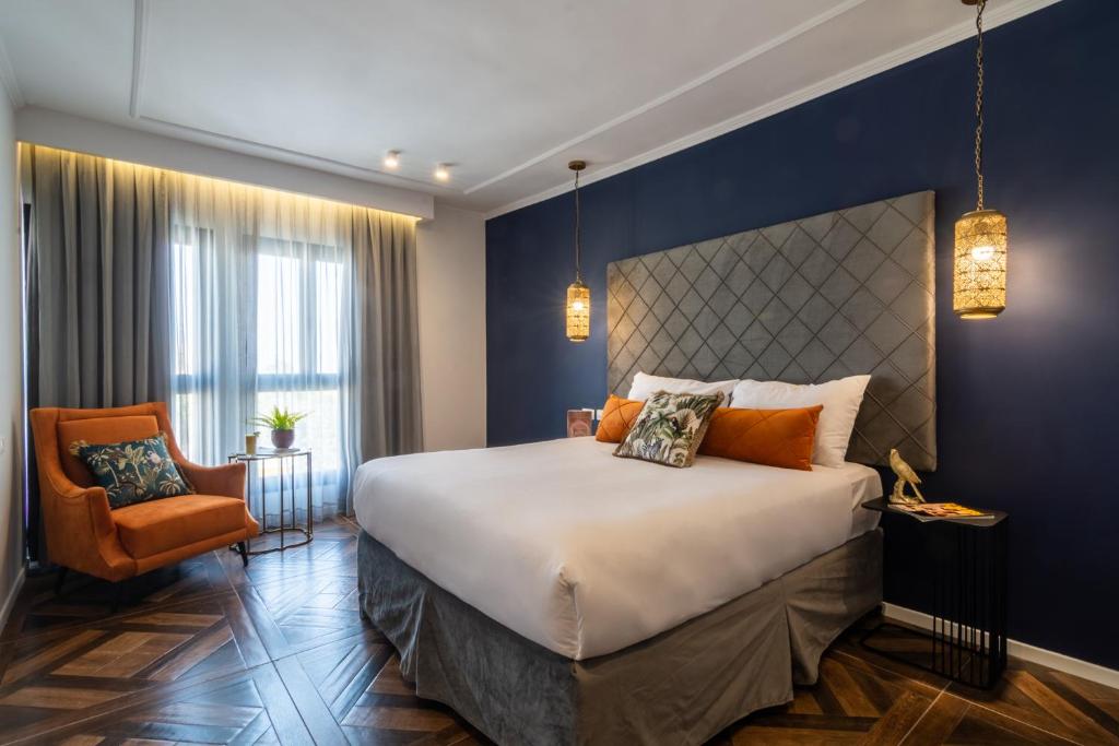 Postel nebo postele na pokoji v ubytování Eldan Hotel