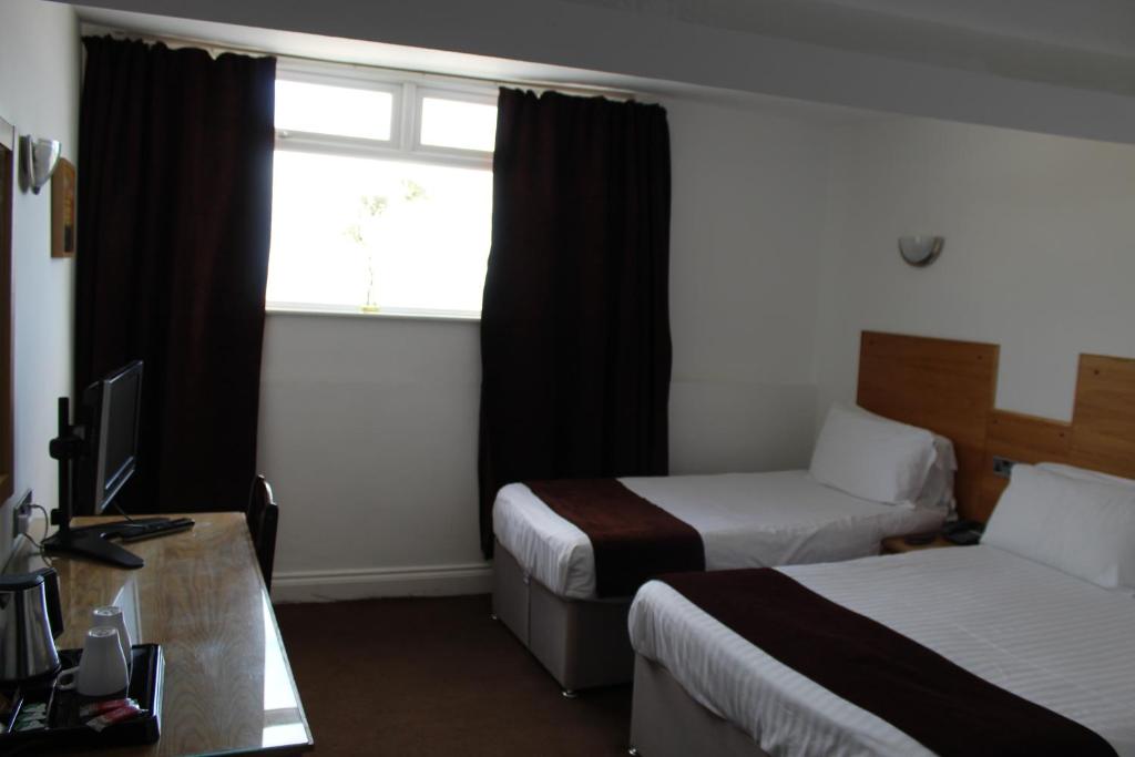 Four Saints Brig Y Don Hotel - Resim 25