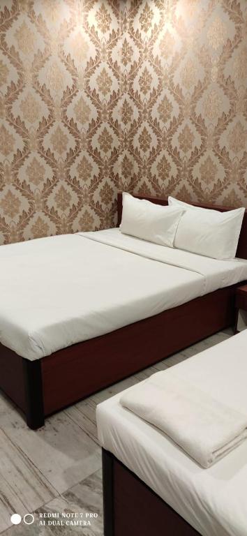 Postel nebo postele na pokoji v ubytování HOTEL PARK VICTORIA