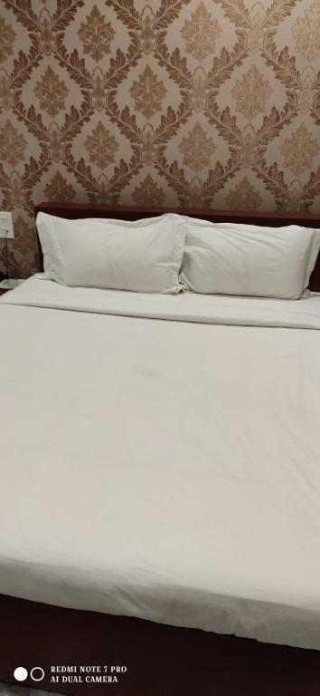 Postel nebo postele na pokoji v ubytování HOTEL PARK VICTORIA