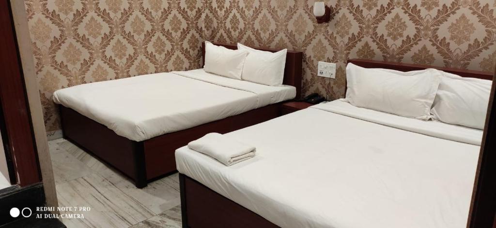 Postel nebo postele na pokoji v ubytování HOTEL PARK VICTORIA