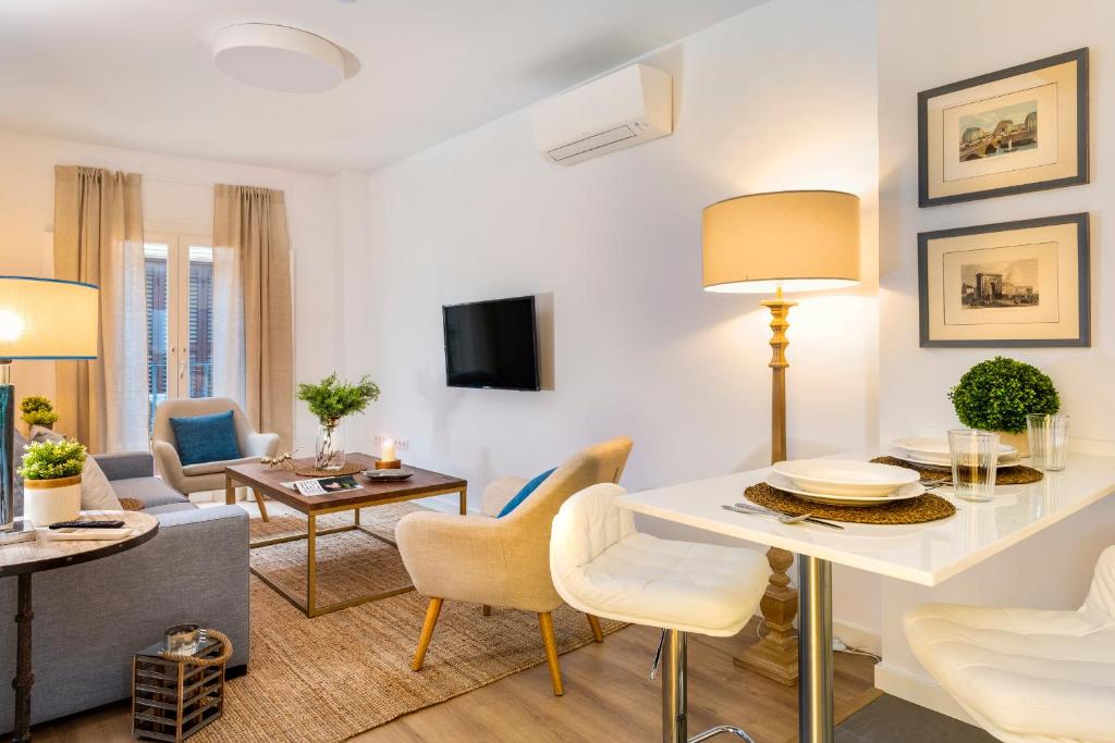 Televízia a/alebo spoločenská miestnosť v ubytovaní Genteel Home Baños