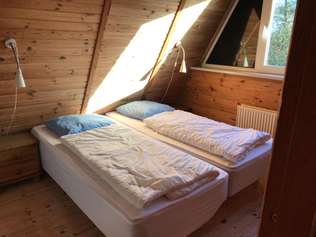 Postel nebo postele na pokoji v ubytování Storkesøen Ribe Holiday Cottages and Apartments