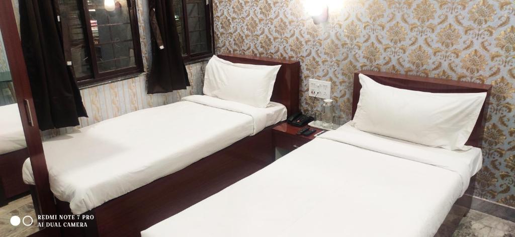 Postel nebo postele na pokoji v ubytování HOTEL PARK VICTORIA