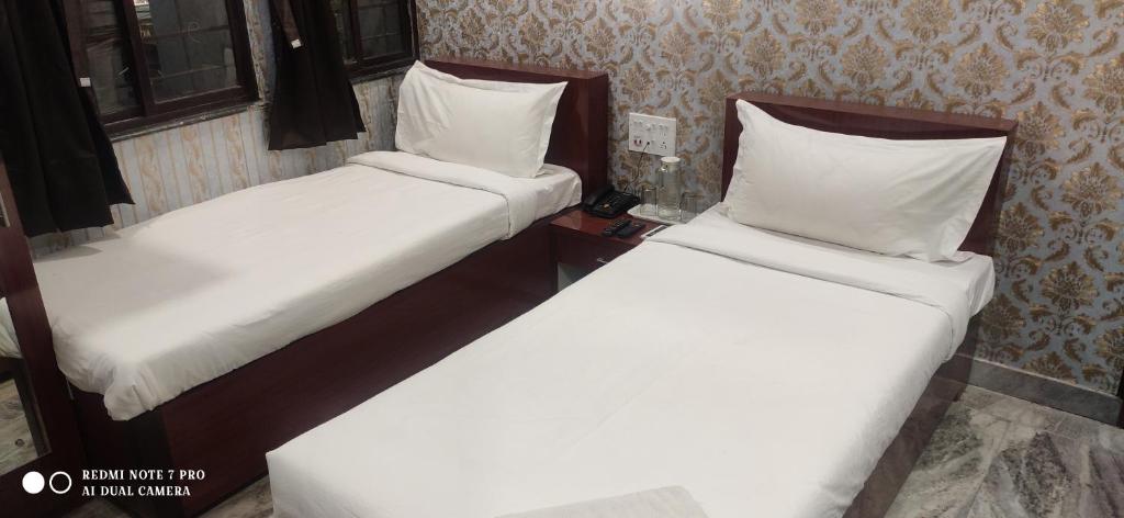 Postel nebo postele na pokoji v ubytování HOTEL PARK VICTORIA