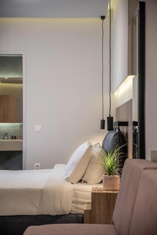 Postel nebo postele na pokoji v ubytování Morum City Hotel Chania