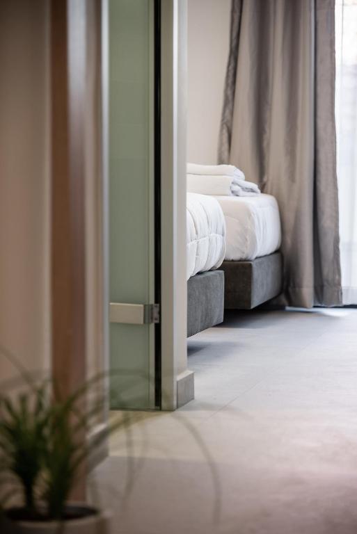 Postel nebo postele na pokoji v ubytování Morum City Hotel Chania