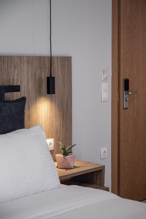 Postel nebo postele na pokoji v ubytování Morum City Hotel Chania