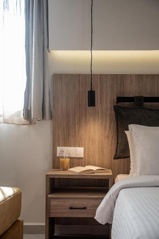 Postel nebo postele na pokoji v ubytování Morum City Hotel Chania