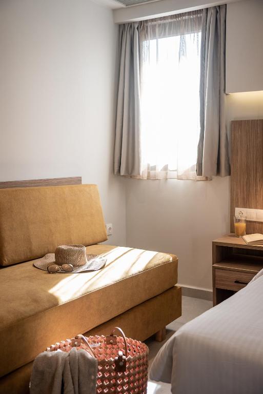 Postel nebo postele na pokoji v ubytování Morum City Hotel Chania