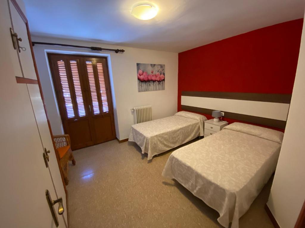 Postel nebo postele na pokoji v ubytování El Puente