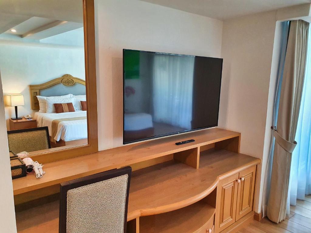 TV a/nebo společenská místnost v ubytování Sea Pearl Beach Resort