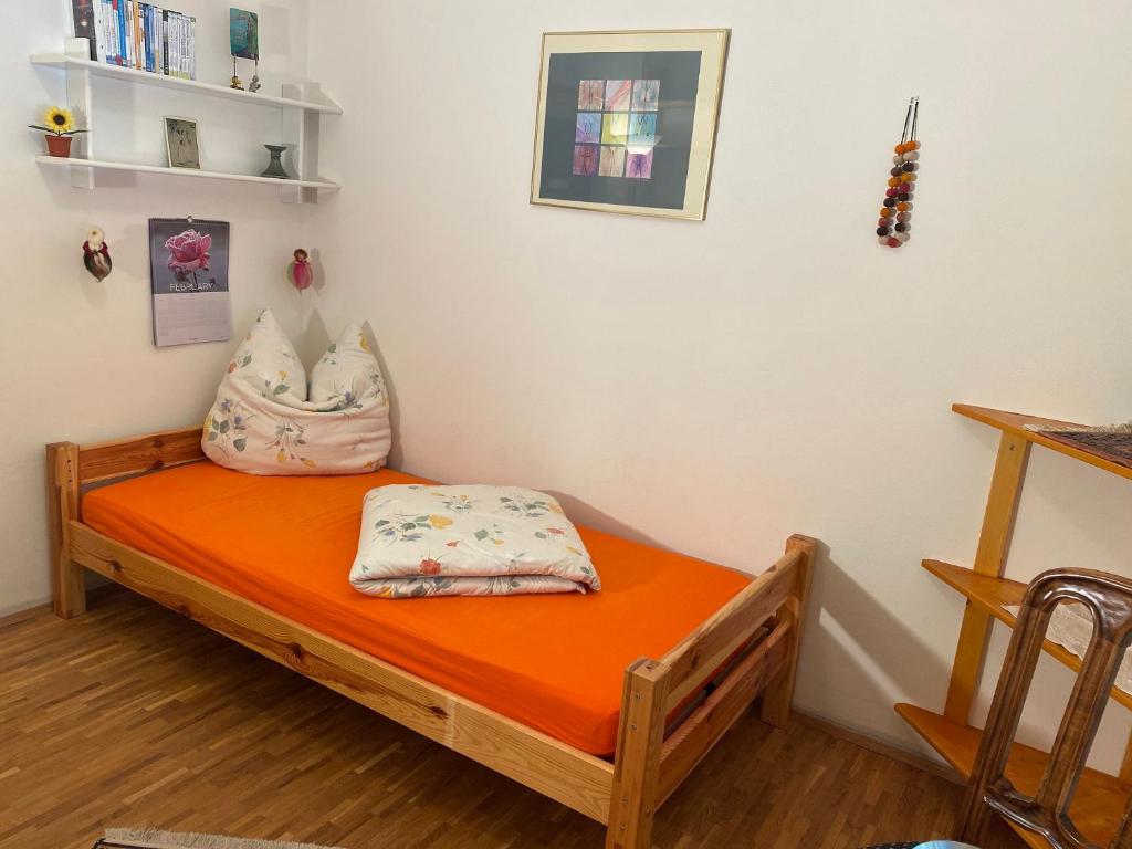 Postel nebo postele na pokoji v ubytování Haus am Waldpark
