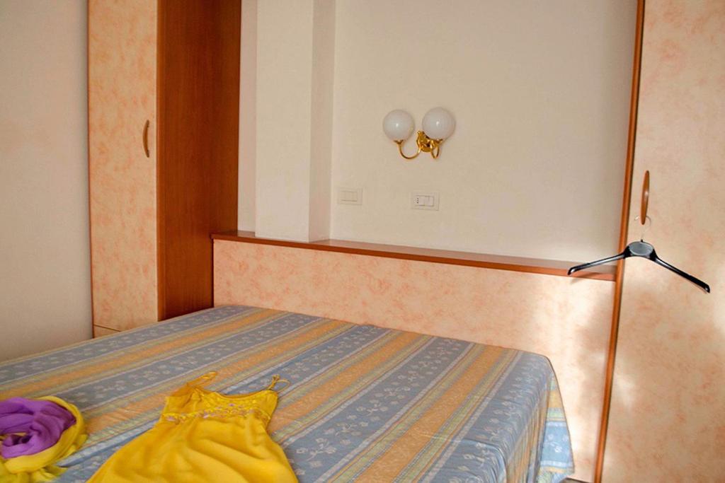 A bed or beds in a room at Residence Comfort