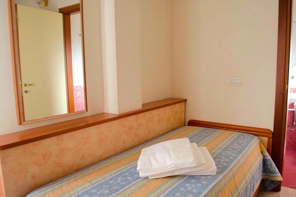 A bed or beds in a room at Residence Comfort