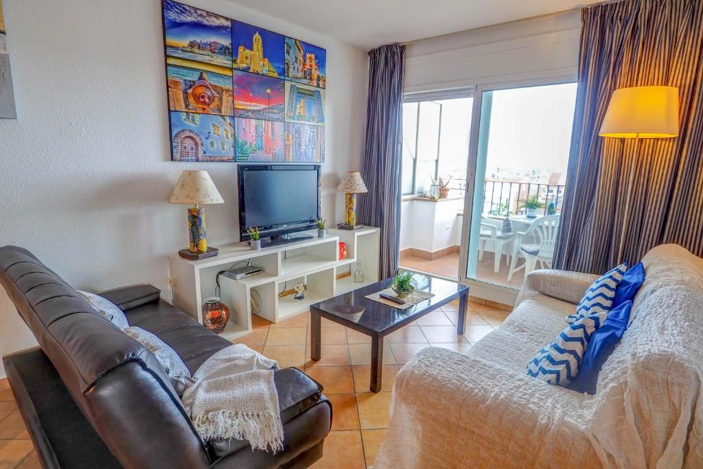 TV a/nebo společenská místnost v ubytování Linda Vista Oasis Penthouse by Hello Homes Sitges