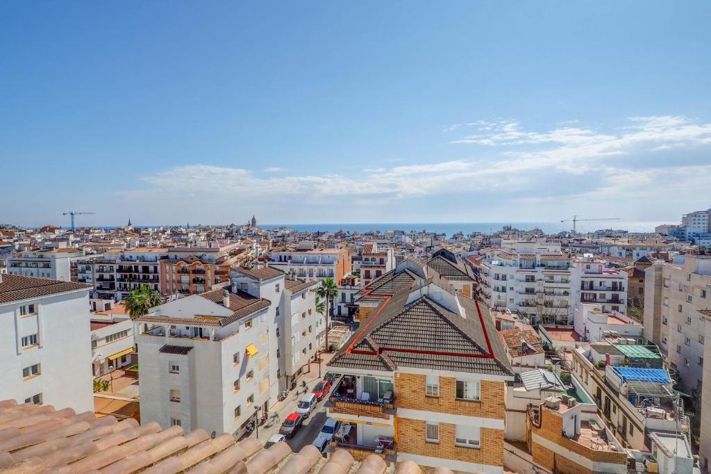 Nespecifikovaný výhled na destinaci Sitges nebo výhled na město při pohledu z apartmánu