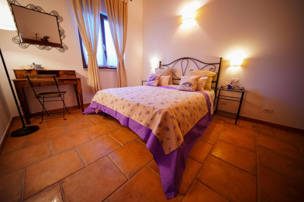 Postel nebo postele na pokoji v ubytování Fonte Murata B&B