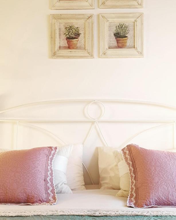 Postel nebo postele na pokoji v ubytování Fonte Murata B&B