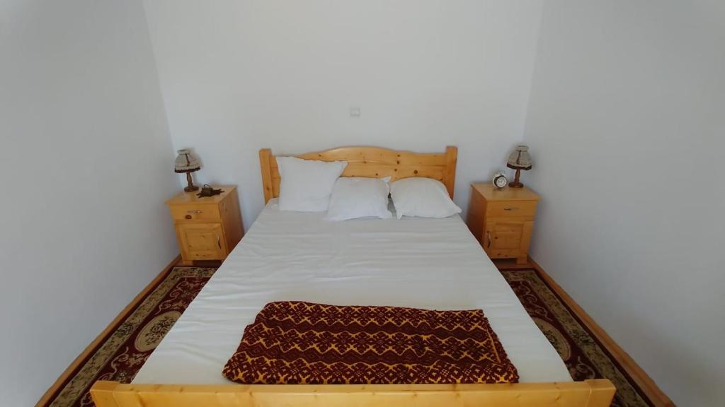 Postel nebo postele na pokoji v ubytování Casa Darius
