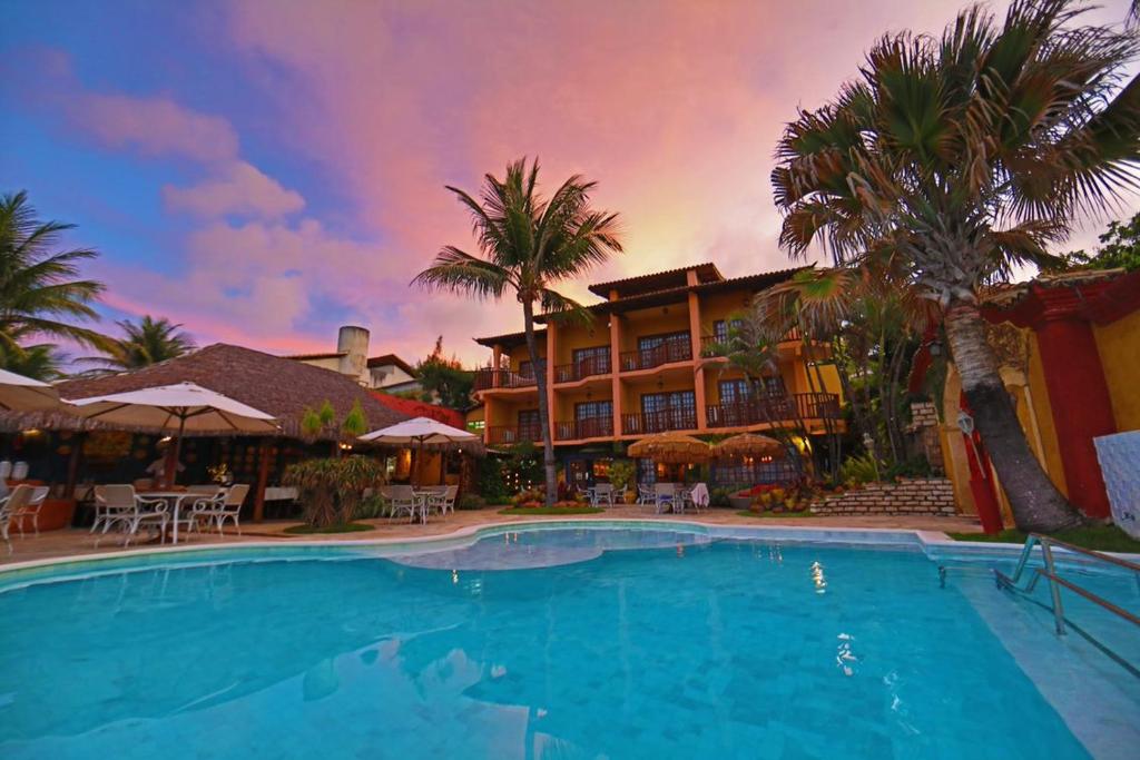 A piscina localizada em Manary Praia Hotel ou nos arredores