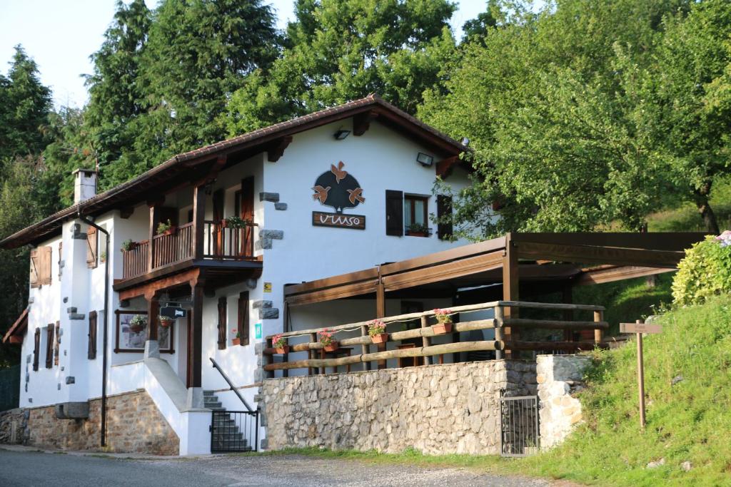 a large white building with a balcony at Casa Rural Iruso in Leitza