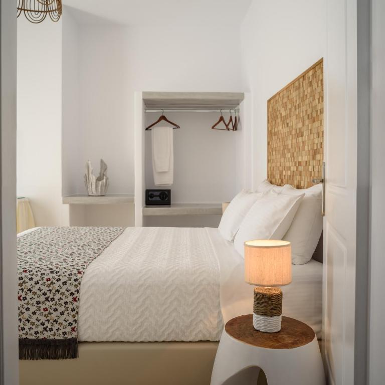Postel nebo postele na pokoji v ubytování Mirabeli Apartments & Suites