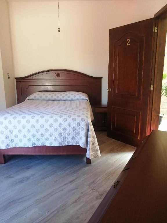 Postel nebo postele na pokoji v ubytování Hotel San Diego